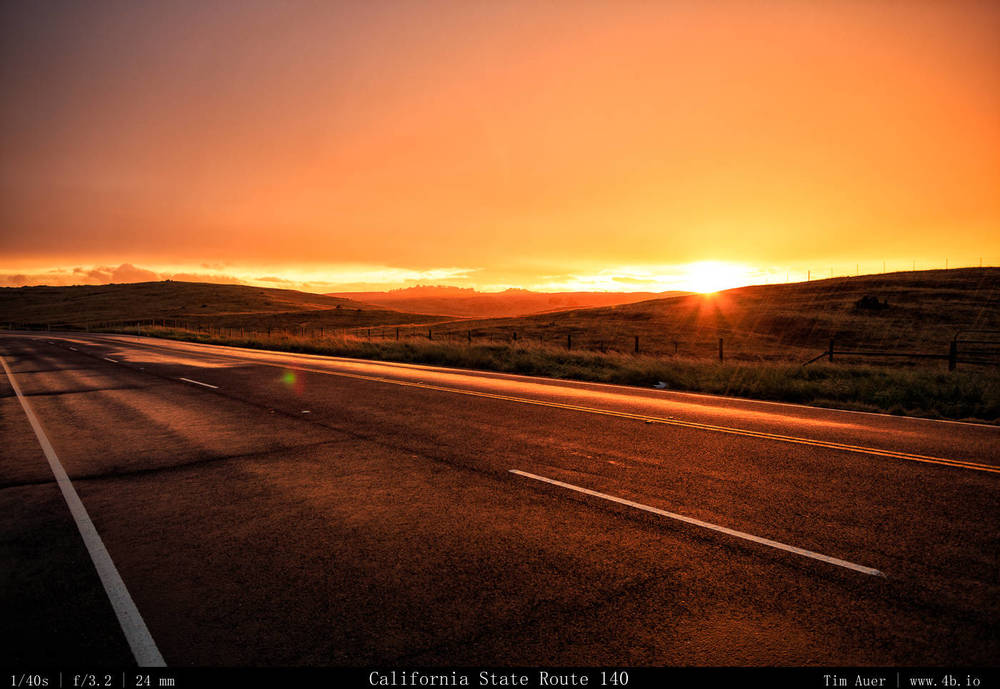 Drive to Yosemite. Transitioning weather on CA-140 as the sunset. Note the rain drops on this image. Behind me was a dramatic full rainbow. 